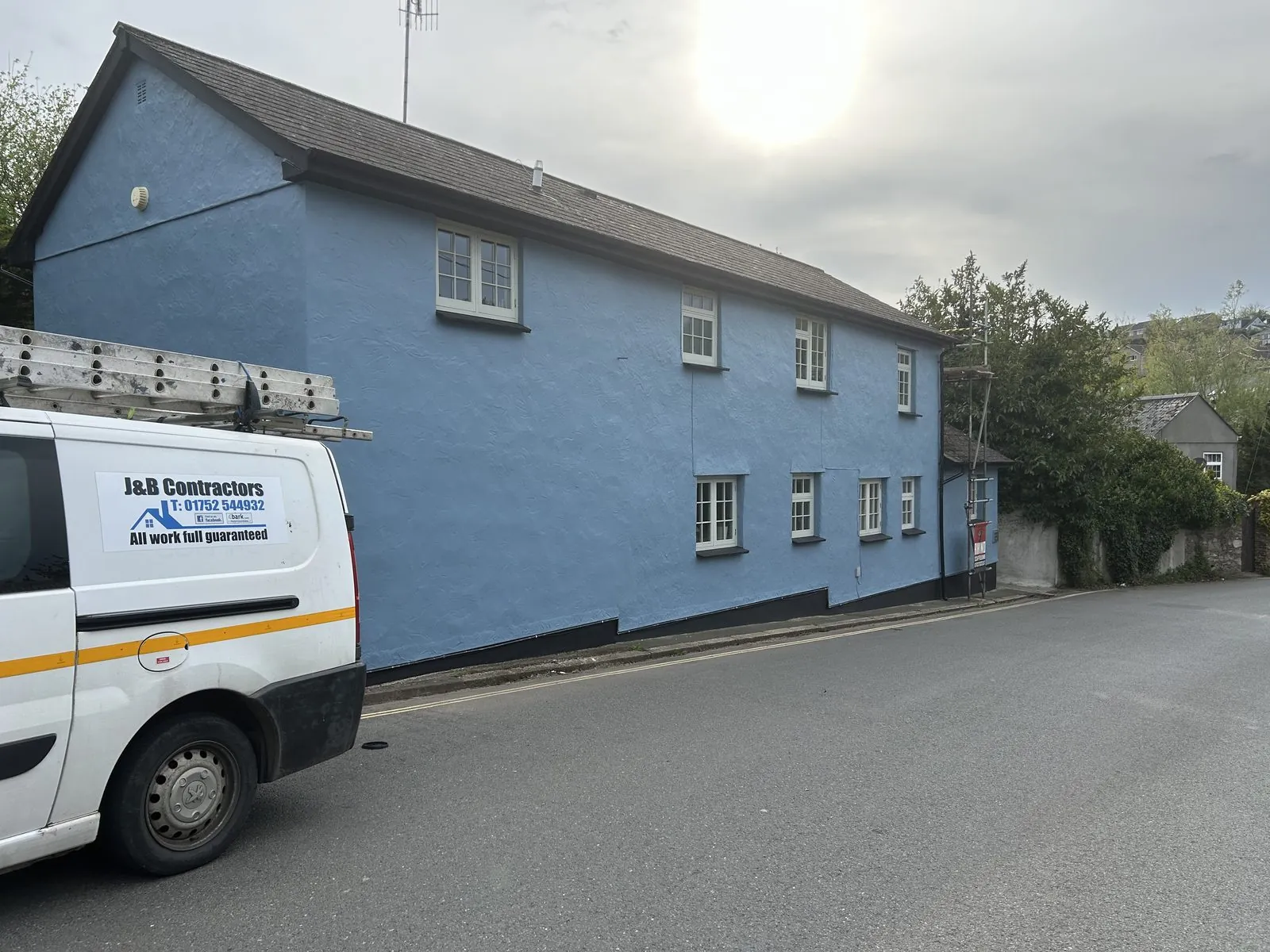 Exterior painting of a detached house in Budleigh Salterton